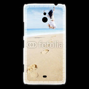 Coque Nokia Lumia 1320 Femme sautant face à la mer